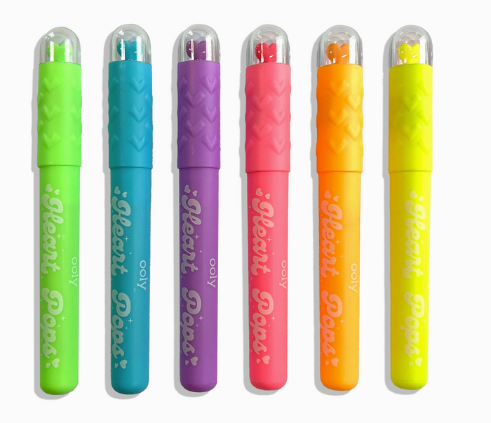 Set of six colorful 'Glow Pens' on a white background