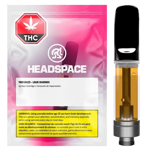 Front-facing image of a Troparazzi Liquid Diamond Vape Cartridge showing the amber-filled cartridge beside pink-gradient Headspace packaging.