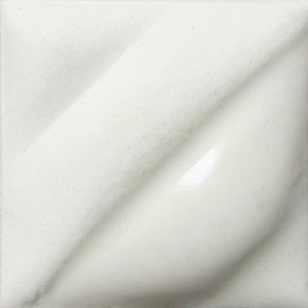 Amaco V-360 White velvet underglaze on an embossed swatch tile, bright white with a partly glossy surface