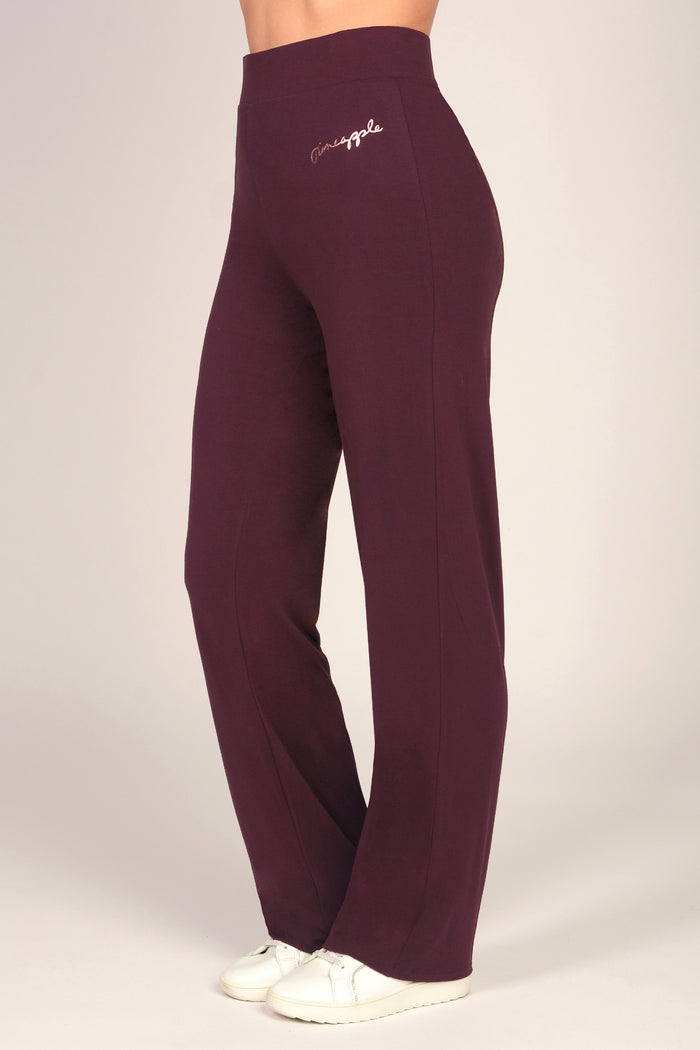 Women's maroon brown viscose jersey trousers on a white background