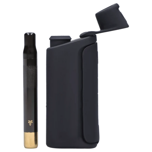 Close-up front view of the X5 One Hitter showing a black metal one-hitter with a brass tip next to its matte black hinged case.